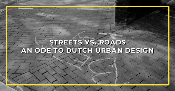 Klinker brick pavement with faint chalk marks behind the essay title Streets vs. Roads