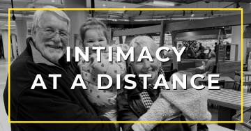 Intimacy at a Distance - grandparents holding their two granddaughters